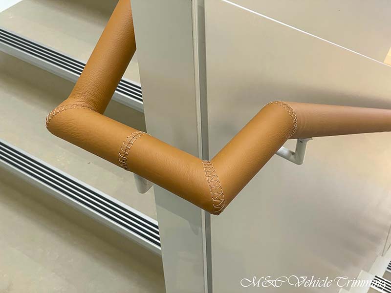 Leather wrapped stair handrails